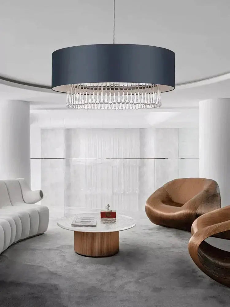 A modern dark gray crystal pendant chandelier with a cylindrical shade and cascading droplets for dining room decorbites crystal pendant