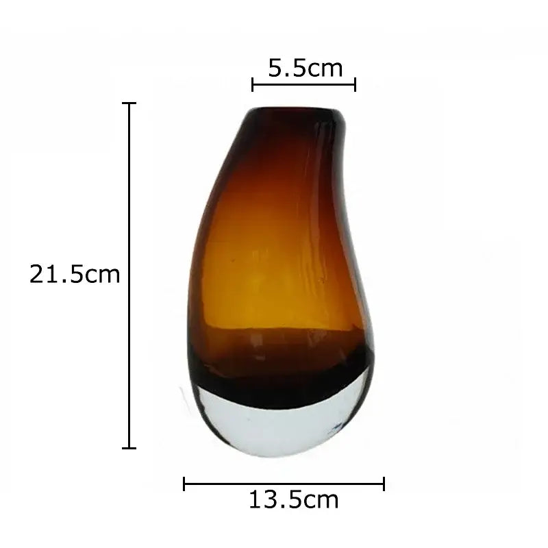 A sleek modern dark gray double glass vase with teardrop shape and gradient amber to dark brown hue for hydroponic decor