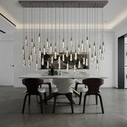 Modern dark metal decorbites crystal ceiling chandelier with teardrop glass pendants for dining room lighting