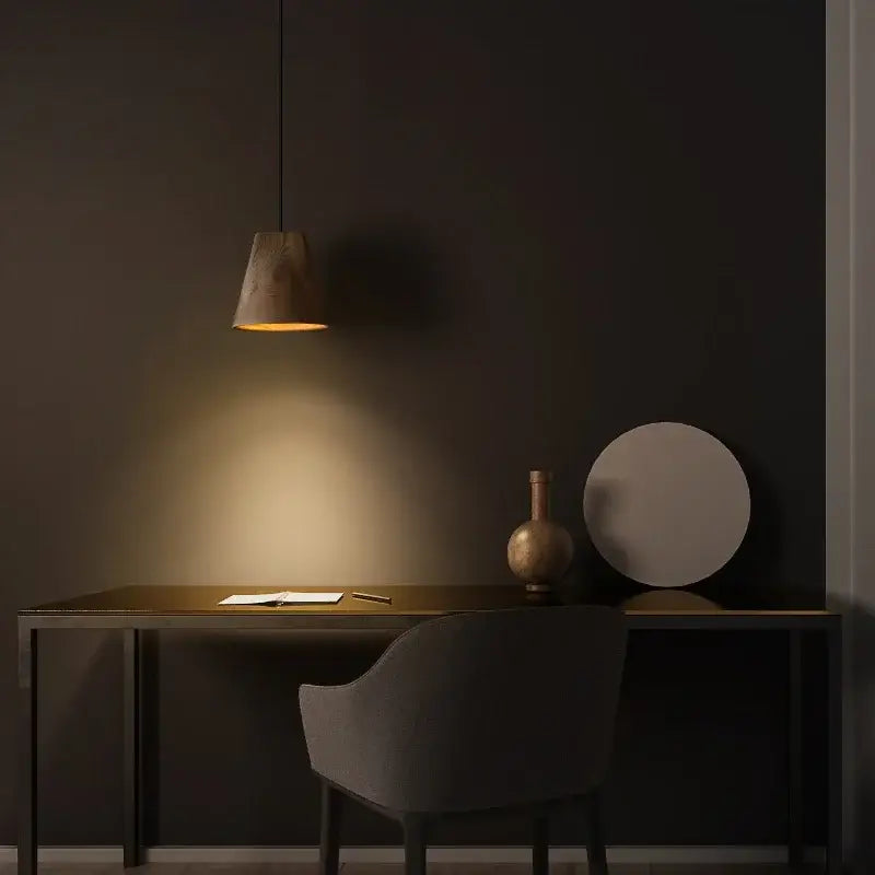 A warm-toned conical pendant light with a textured wooden shade as part of decorbites adjustable wooden chandelier for dining room decor