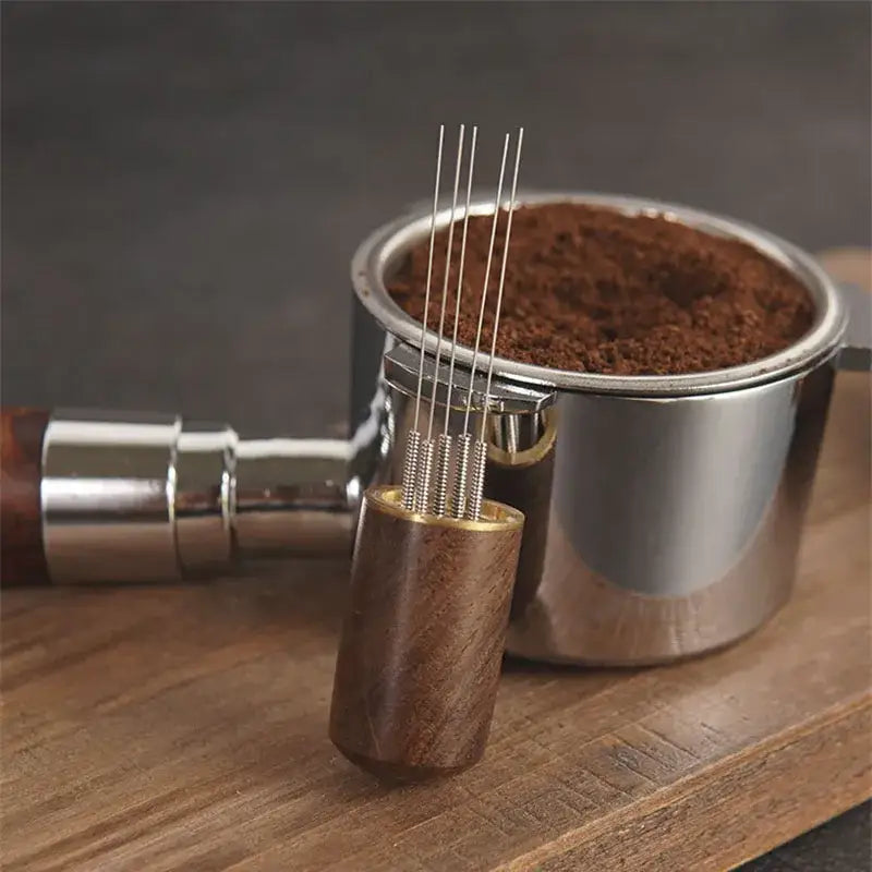 Wooden-handled modern dark wood espresso coffee stirrer with four stainless steel needles for needle distributor use