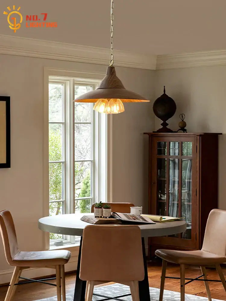 Modern dark wood iron art decorbites pendant lights with warm-toned metal shade and exposed filament bulbs for dining room