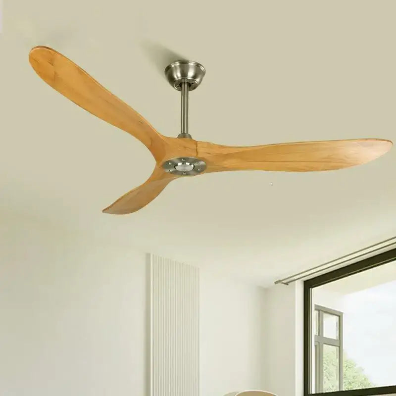 Modern ceiling fan with large light wood blades and brushed metal hub for living room use with remote control