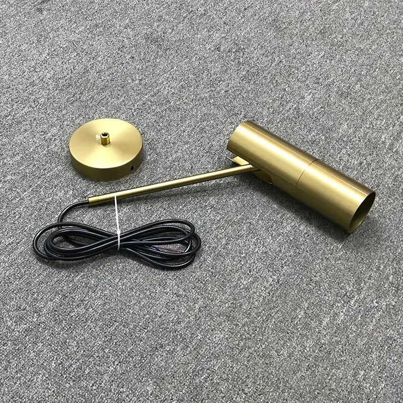 Brass-finished minimalist pendant lamp with cylindrical shade and circular base in decorbites black chandelier style