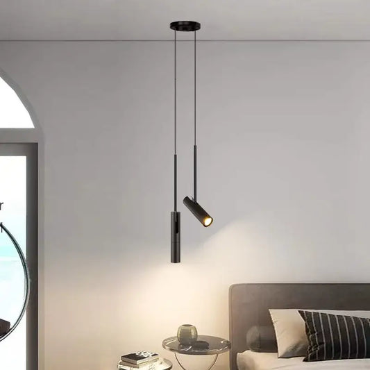 Modern decorbites black chandelier featuring a cylindrical adjustable spotlight pendant for bedroom lighting