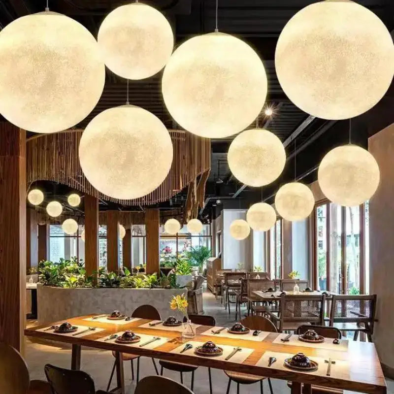 Modern decorbites cream moon led pendant chandelier featuring warm glowing cream moon led spherical pendant lights for living room