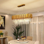 Modern decorbites crystal gold chandelier with gold-toned rectangular frame and vertical crystal rods for living room ceiling