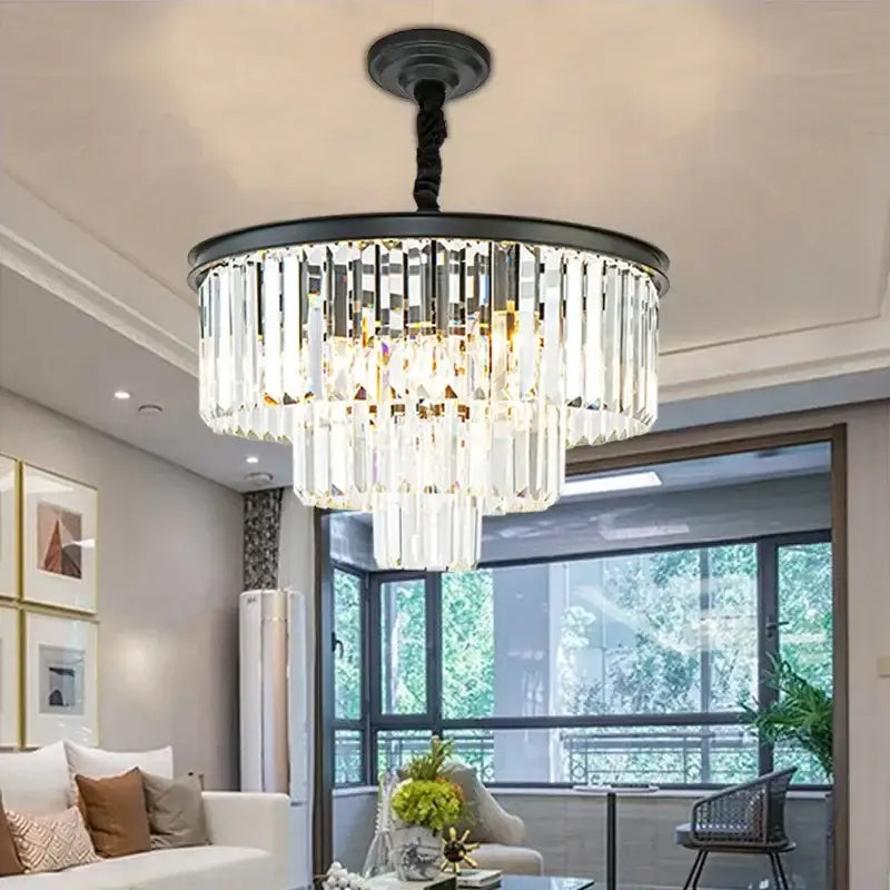 Modern decorbites crystal gold multi-tiered chandelier with black metal frame and clear faceted crystal prisms for dining room led