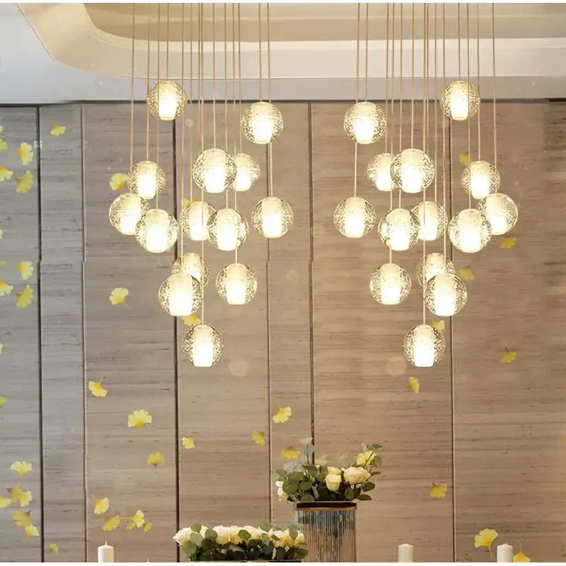 Modern decorbites crystal led glass globe pendant light with warm glowing textured surface for living room chandelier