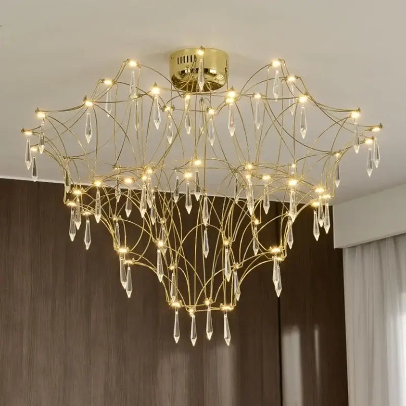 Gold-toned decorbites deluxe crystal star lamp chandelier with intricate wireframe and dangling crystal teardrops for living room