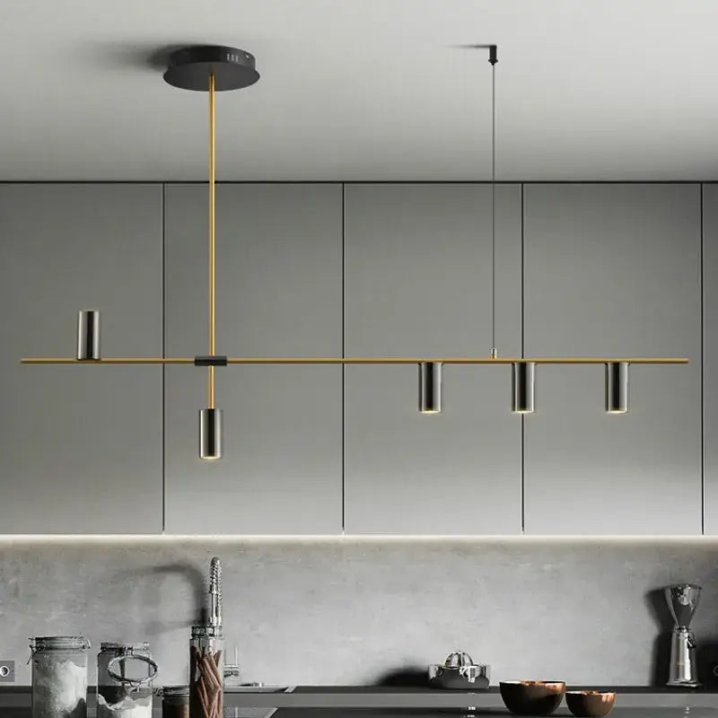 Modern decorbites designer black long chandelier featuring a sleek gold rod and black cylindrical fixtures for dining rooms