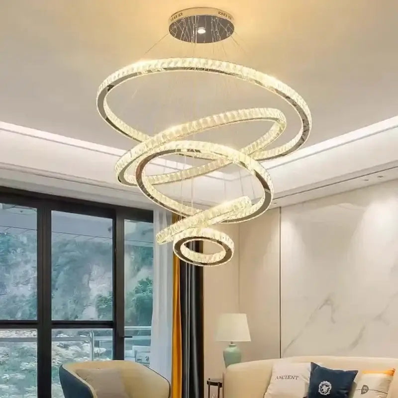 Modern decorbites gold rings crystal chandelier featuring glowing spiral rings with clear crystal and metallic frames
