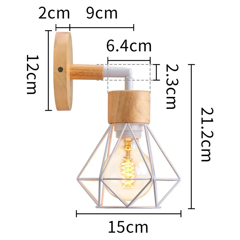 A rustic wood wall lamp with a decorbites iron white cage featuring an exposed filament bulb for bedroom use