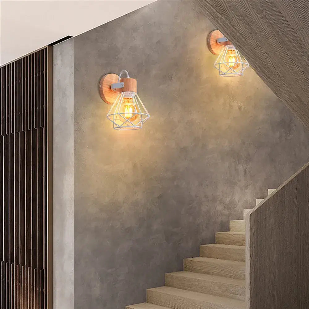 Modern decorbites iron white cage wall lamp with warm wooden backplate and exposed filament bulb for bedroom decor