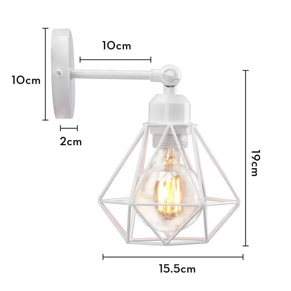 Modern decorbites iron white cage wall lamp featuring a white geometric iron cage and visible filament bulb for bedroom use