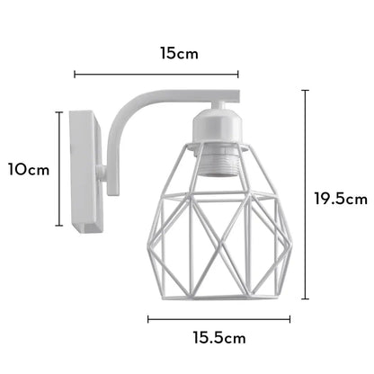 White metal wall lamp with a geometric iron white cage design by decorbites for modern bedroom wall sconce decor