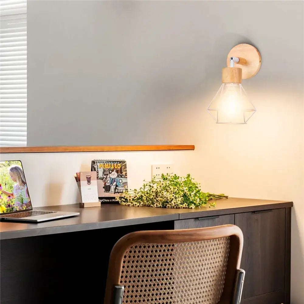 A warm modern decorbites iron white cage wall lamp with geometric glass shade and natural wood sconce for bedroom