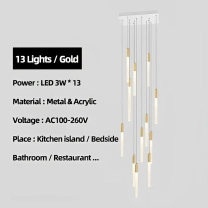 A modern decorbites luxe gold tube chandelier with 13 slender led bulbs on white metal acrylic mount for dining room lighting