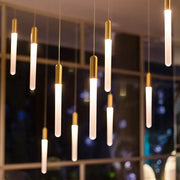 Modern decorbites luxe gold tube pendant lights with frosted glass and gold-toned caps for dining room lighting