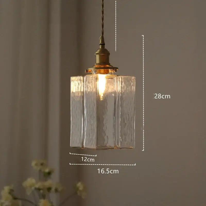 Modern diamond amber glass led pendant light featuring clear textured amber glass with brass fixture for dining rooms