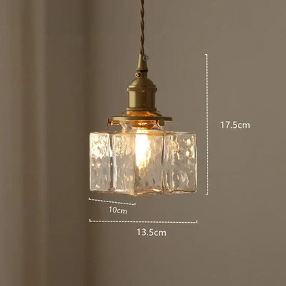 Modern diamond amber glass led pendant light with brass finish and textured clear amber glass for dining rooms
