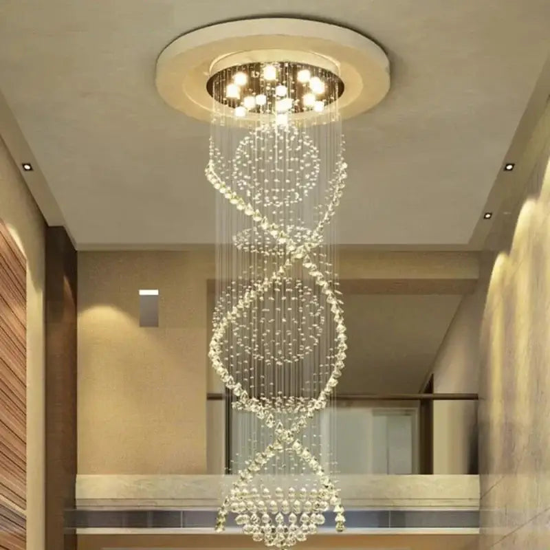 A modern double spiral crystal chandelier with clear faceted crystals suspended from an elegant circular fixture