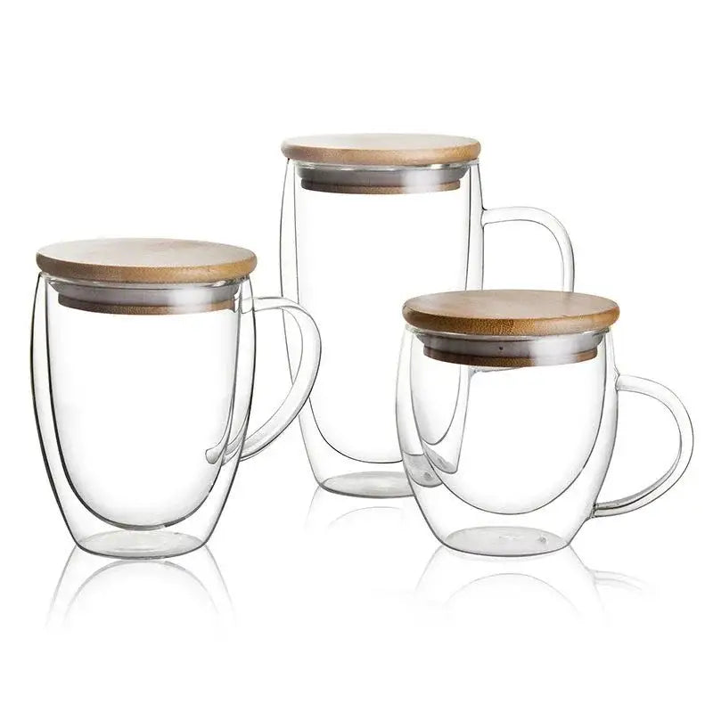 Set of three clear double wall beer whiskey wine glass mugs with bamboo lids for modern kitchen use