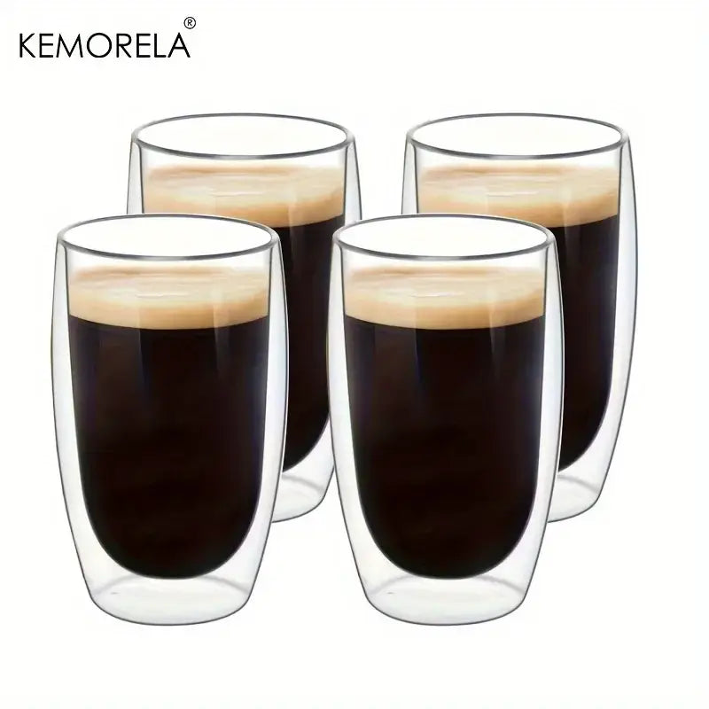 Modern double wall glass coffee mugs filled with dark espresso and creamy crema in an insulated kitchen tumbler set