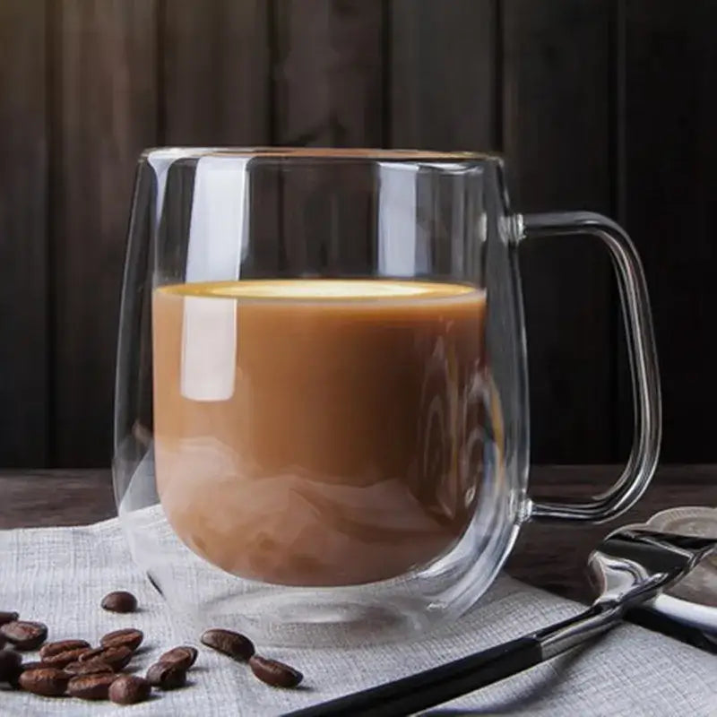 Modern double walled glass coffee mug with creamy brown beverage features a sturdy handle decorbites glass coffee cup