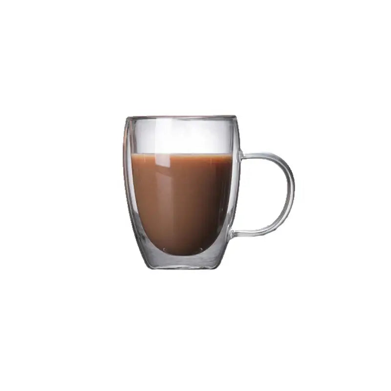 Modern double walled transparent glass cup with handle filled with brown liquid as a glass cup for kitchen use