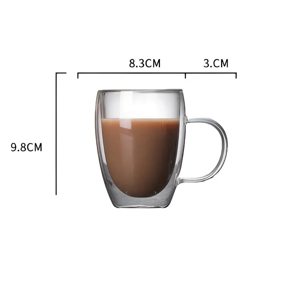 Modern double walled transparent glass cup filled with brown liquid glass cup with handle for kitchen and dining room use
