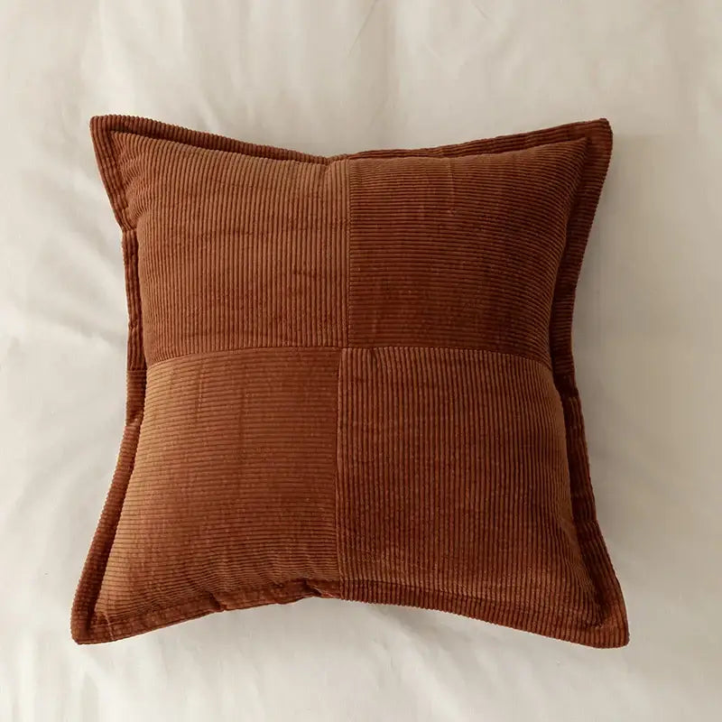 A rust-colored square corduroy pillow cover with quilted patchwork design for modern living room decorbites corduroy pillow