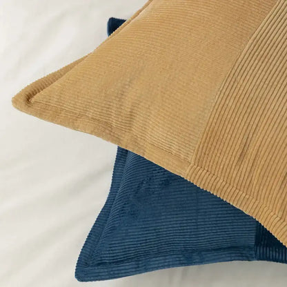 Modern earth tone tan corduroy pillow cover with subtle ribbed texture and neatly stitched edges for living room decorbites