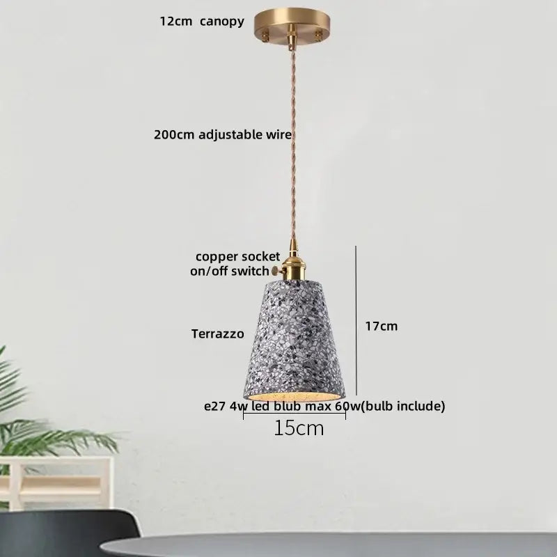 A sleek 17cm tall modern earthy decorbites terrazzo stone led pendant light with brass canopy for dining room decor