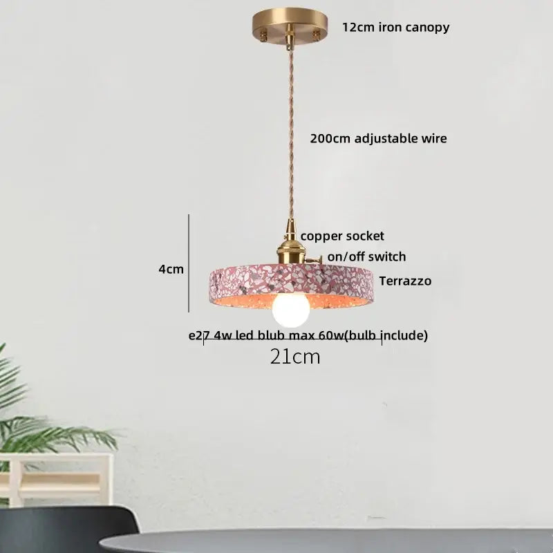 Modern earthy terrazzo stone led pendant light with brass iron canopy and pink white terrazzo pattern for dining room decorbites