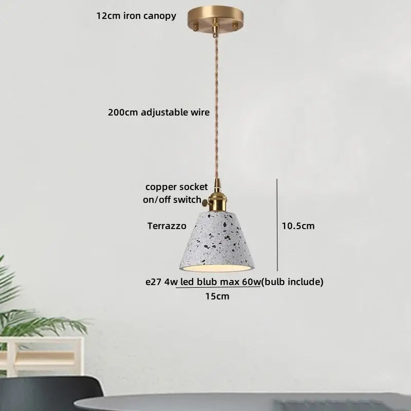 Modern earthy terrazzo stone led pendant light with speckled terrazzo shade and brass-finished canopy for dining room decorbites