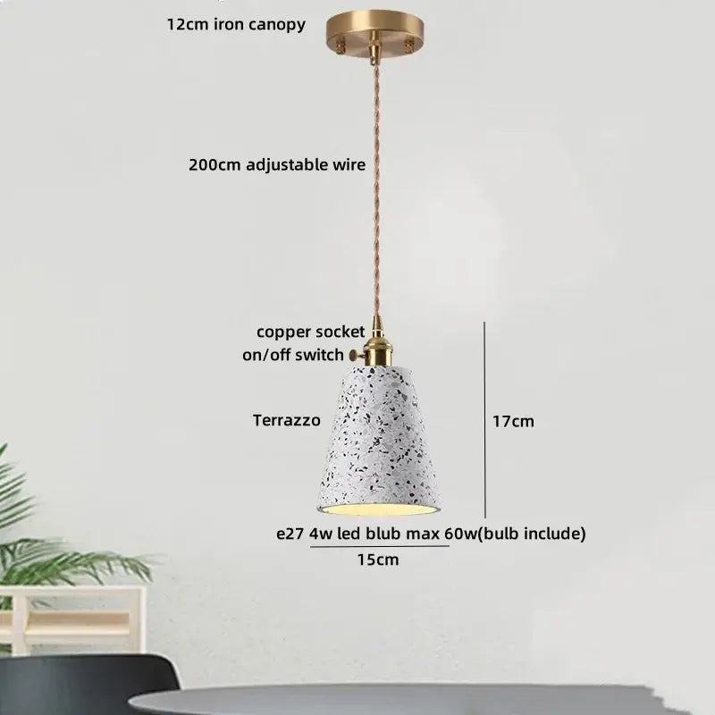Modern earthy terrazzo stone led pendant light with white terrazzo stone, black speckles, brass canopy, copper socket for dining room decorbites terrazzo stone