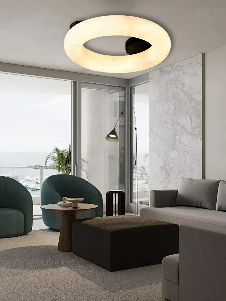 Modern elegant alabaster marble ceiling chandelier with a warm glow and sleek black accent for living room lighting