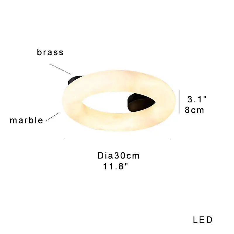 A sleek modern elegant alabaster marble ceiling chandelier with a creamy marble body and black brass accents