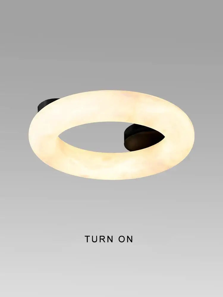 Modern elegant alabaster marble ceiling chandelier with a warm off-white body and black mounting hardware for living room