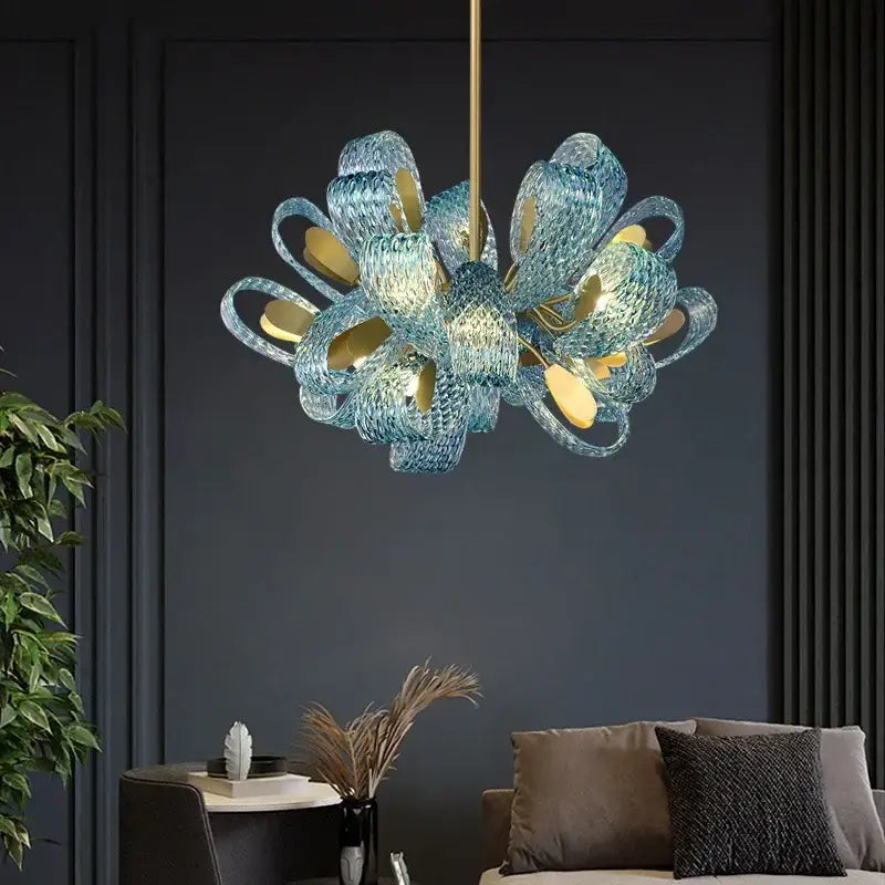 Modern elegant blue copper led flower chandelier with translucent blue glass petals and gold accents for living room decorbites elegant blue
