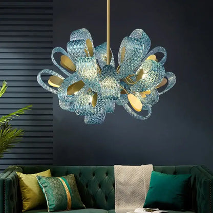 Modern elegant blue copper led flower chandelier with translucent blue glass petals and gold-toned accents for living room decorbites elegant blue copper led
