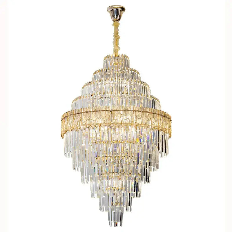 A decorbites elegant crystal chandelier with multi-tiered gold metal accents and cascading clear glass prisms for dining rooms