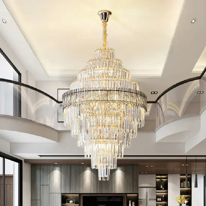 A decorbites elegant crystal chandelier with multi-tiered gold and clear glass prisms for modern dining room decor