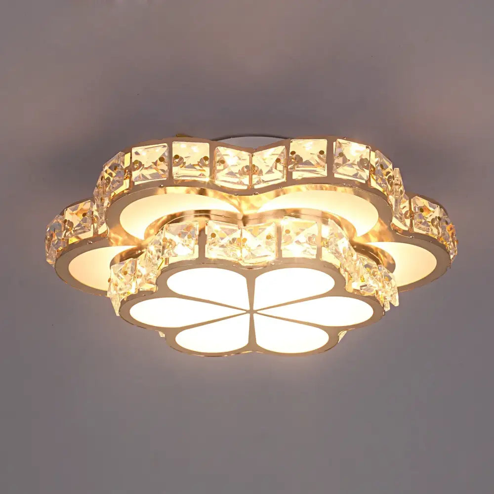 Modern elegant gold-toned ceiling lamp with floral design and clear crystal led chandelier accents for living room lighting