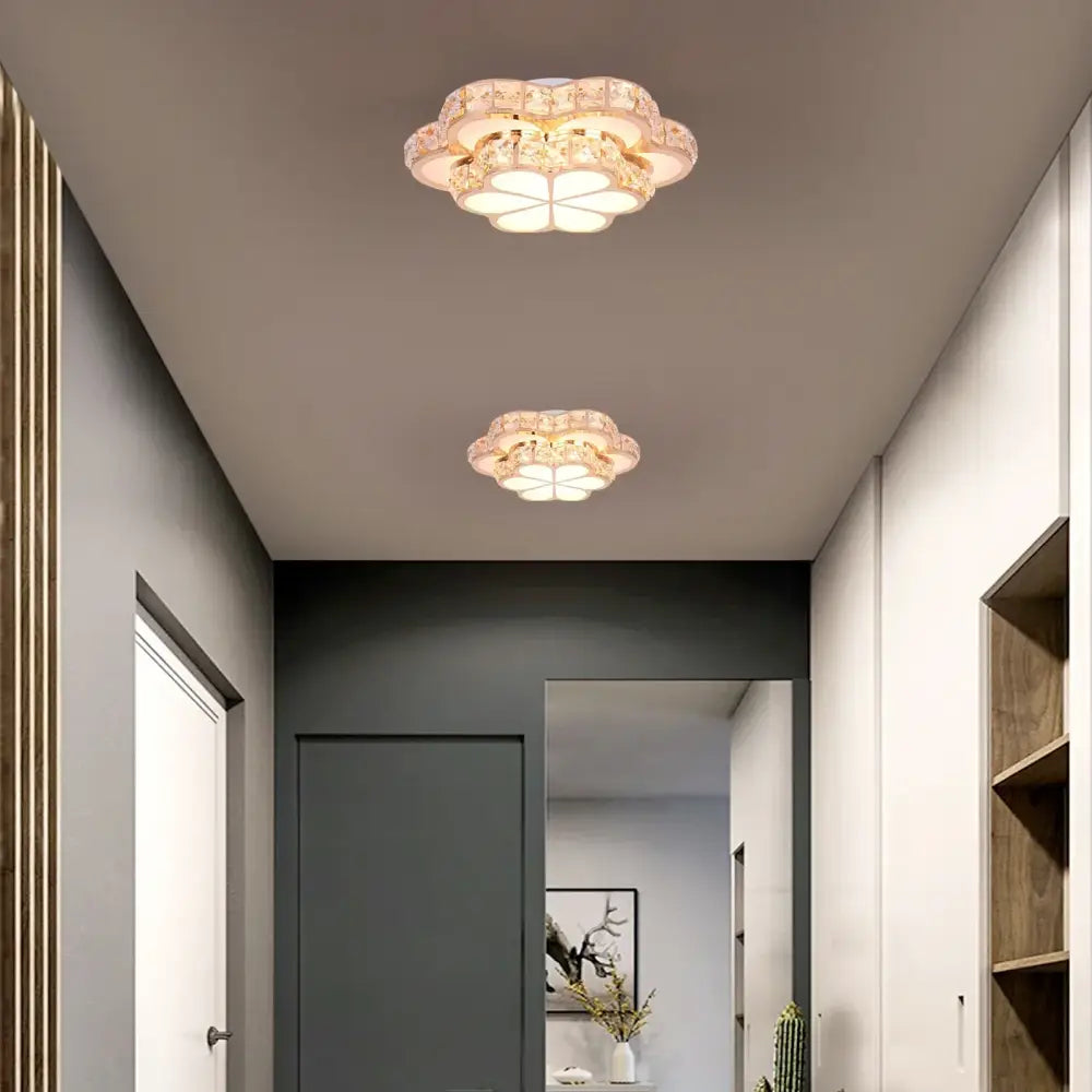 Two elegant flower-shaped crystal led ceiling lamps with warm white illumination for modern living room decor