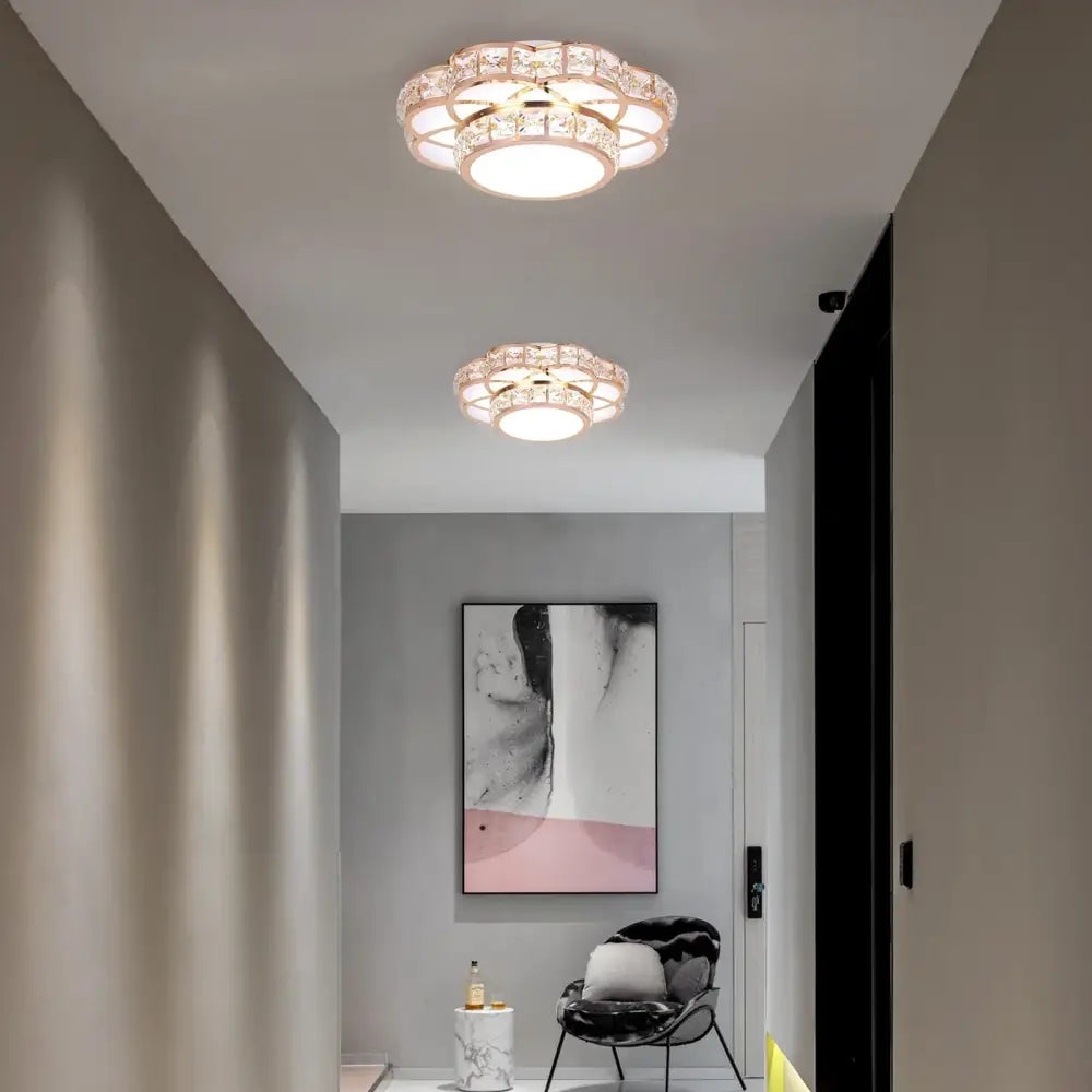 Two elegant circular ceiling lamps with crystal led chandelier design and warm white illumination for living rooms