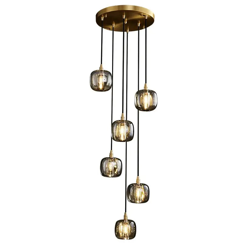 Modern brass-finished pendant light with six smoked glass globes for decorbites elegant rotating staircase use