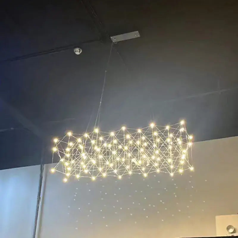 A modern elegant stainless steel geometric led chandelier with warm white lights for dining room decorbites elegant stainless