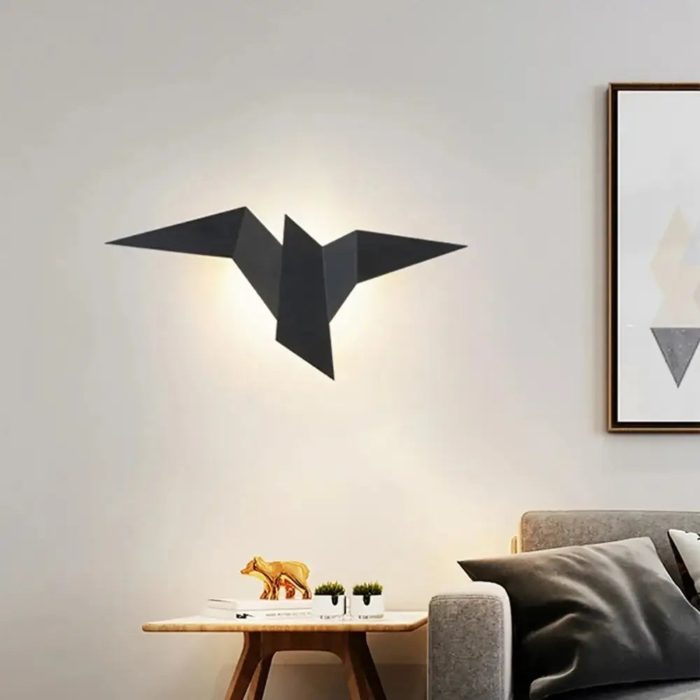 Black origami-style wall lamp with sleek geometric design for bedroom study decorbites elegant triangular led lighting